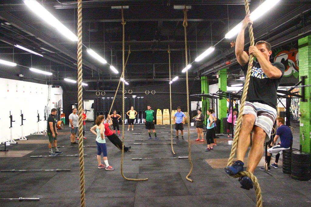 Going over the rope climb